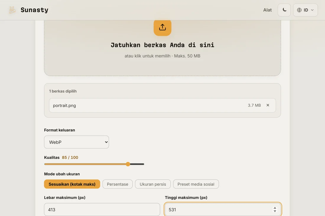 Pengubah ukuran gambar dengan foto potret dimuat dan 413 kali 531 piksel dimasukkan sebagai dimensi keluaran